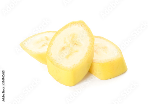 Slices of tasty banana on white background