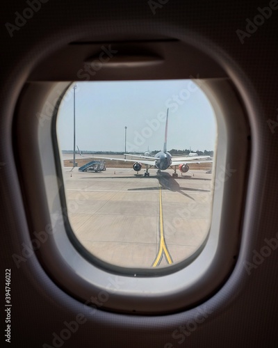 View from the window of the airfield and the plane. High quality photo