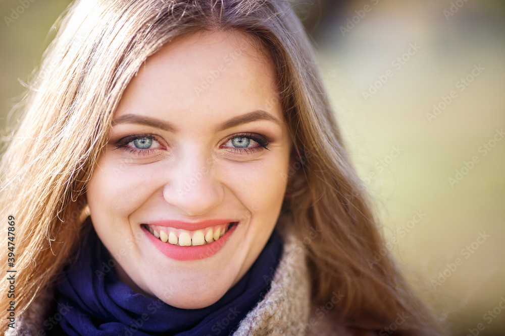 close up portrait of pretty smiling girl with long hair outdoors, beautiful teenager on a background of autumn nature close up portrait of pretty smiling girl with long hair outdoors, beautiful teenager on a background of autumn nature