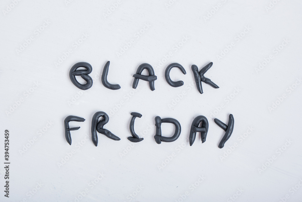the inscription black friday from plasticine on a gray background the inscription black friday from plasticine on a gray background