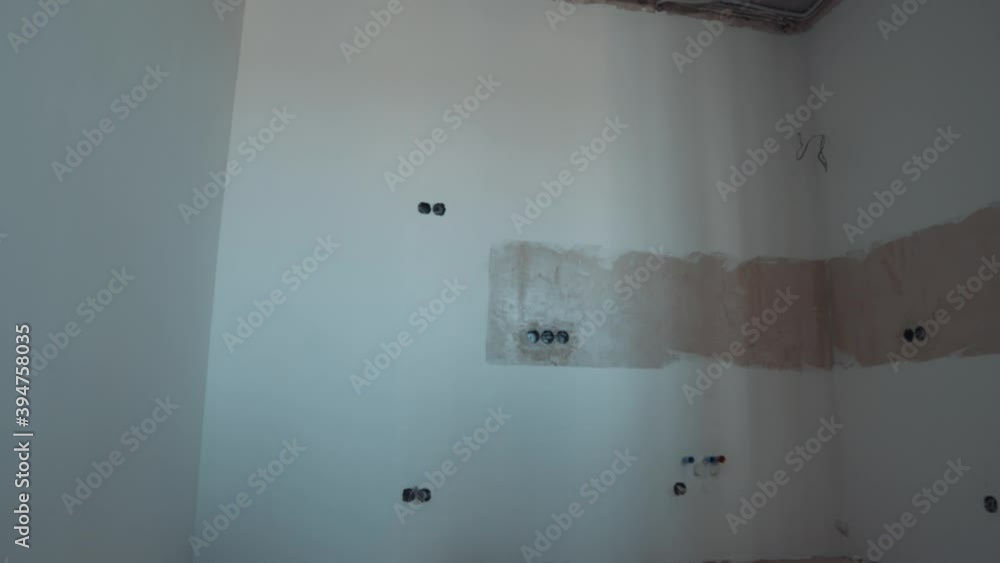 Vidéo Stock White Wall with Circular Electrical Outlets Junction Boxes