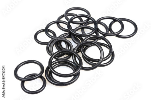 Fotografie O-rings and gaskets in black with free space for the inscription