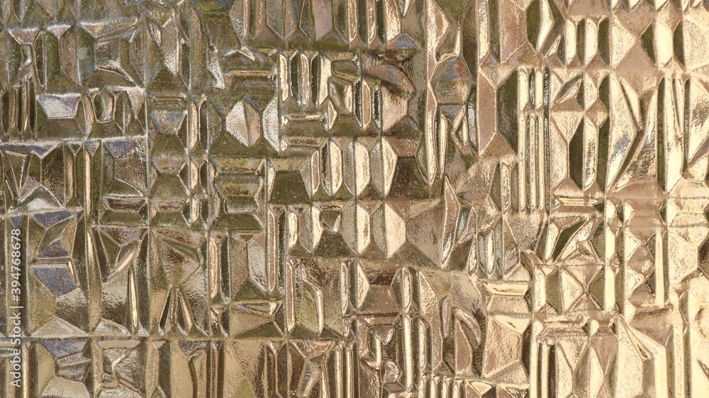 Fototapeta premium relief frosted opaque glass with smooth surface irregularities illuminated by soft light