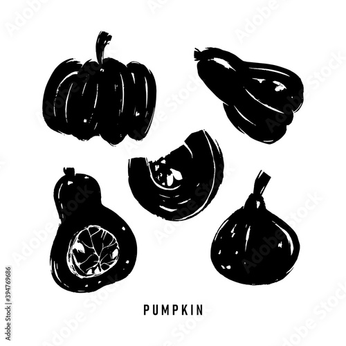 Set of black simple silhouettes of pumpkins. Dry brush texture effect.