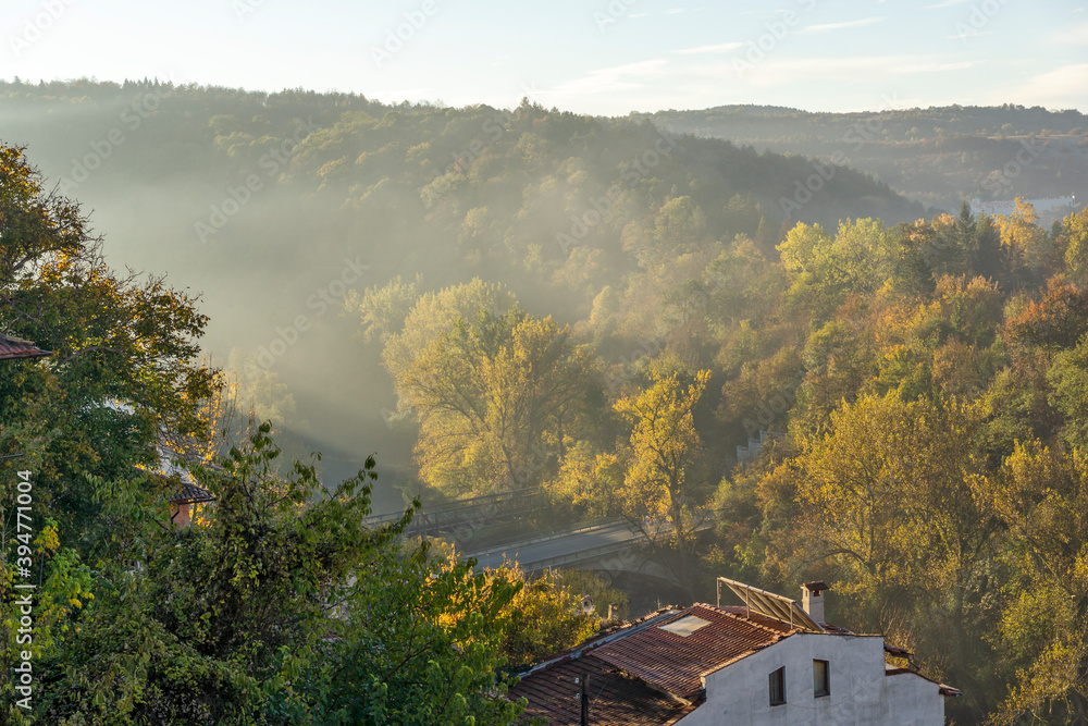 Fototapeta premium VELIKO TARNOVO, BULGARIA -NOVEMBER 2, 2020: Amazing Sunrise view of city of Veliko Tarnovo, Bulgaria