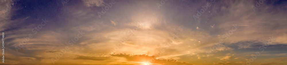 Panoramic view of the cloudy sky at sunset Panoramic view of the cloudy sky at sunset