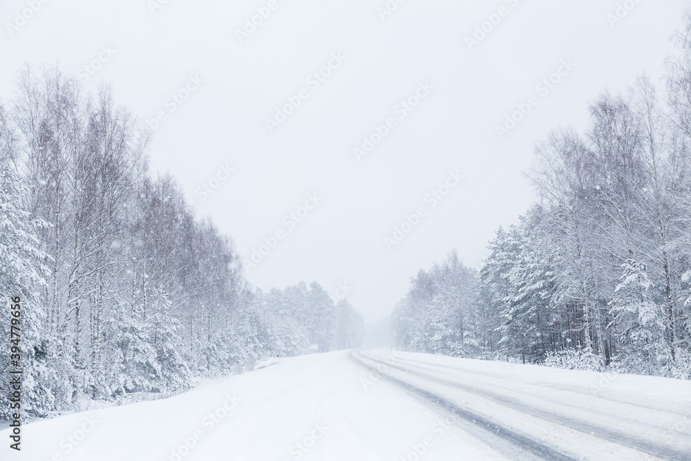 snow covered road in the winter