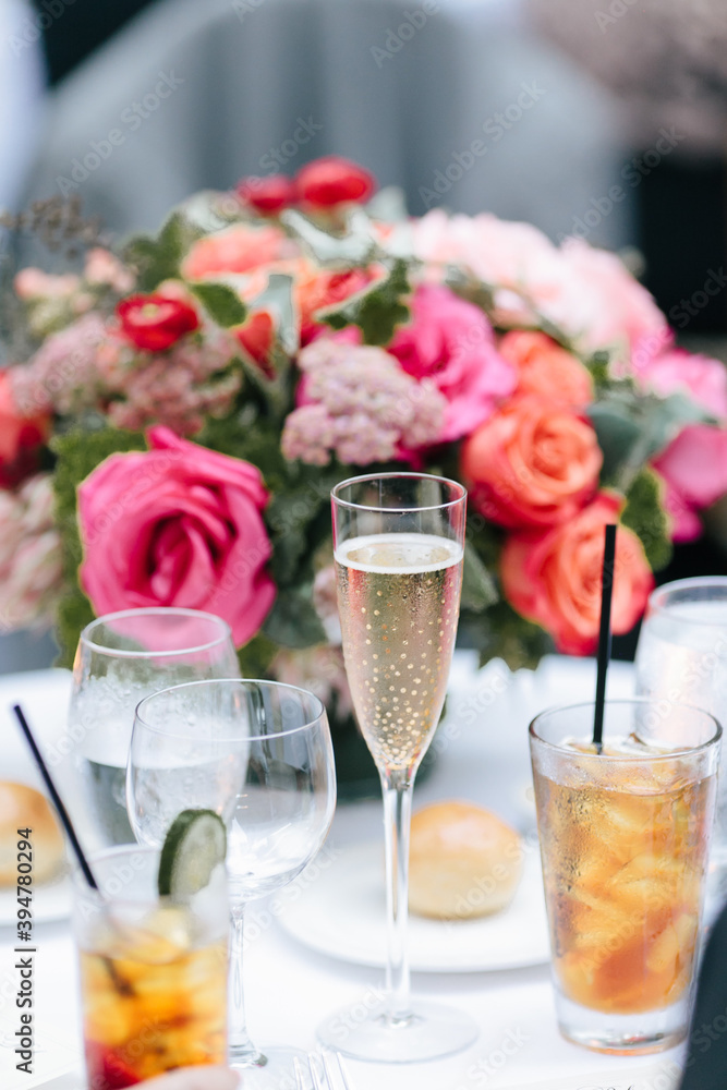 Glass of champagne and other drinks on wedding table Glass of champagne and other drinks on wedding table