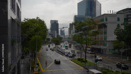 day time singapore city center traffic street pedestrian bridge slow motion panorama 4k photo