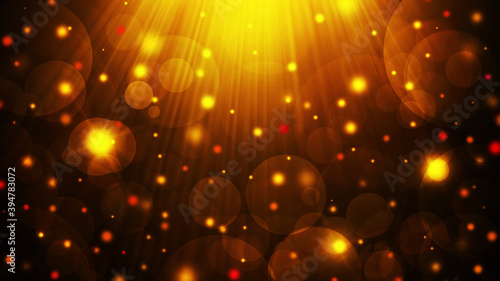Golden and brown abstract gradient bokeh background with circles, rays and sparkles