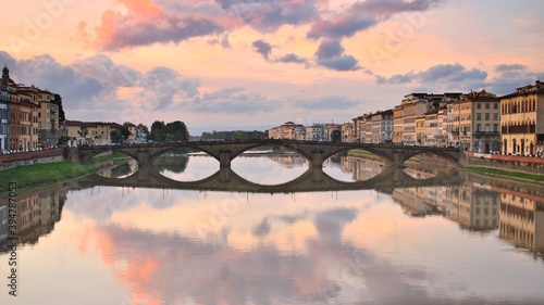 landscape of the city of Florence in Italy in particular of the Ponte alla Carraia that crosses the Arno river between the historic center and the Oltrarno district