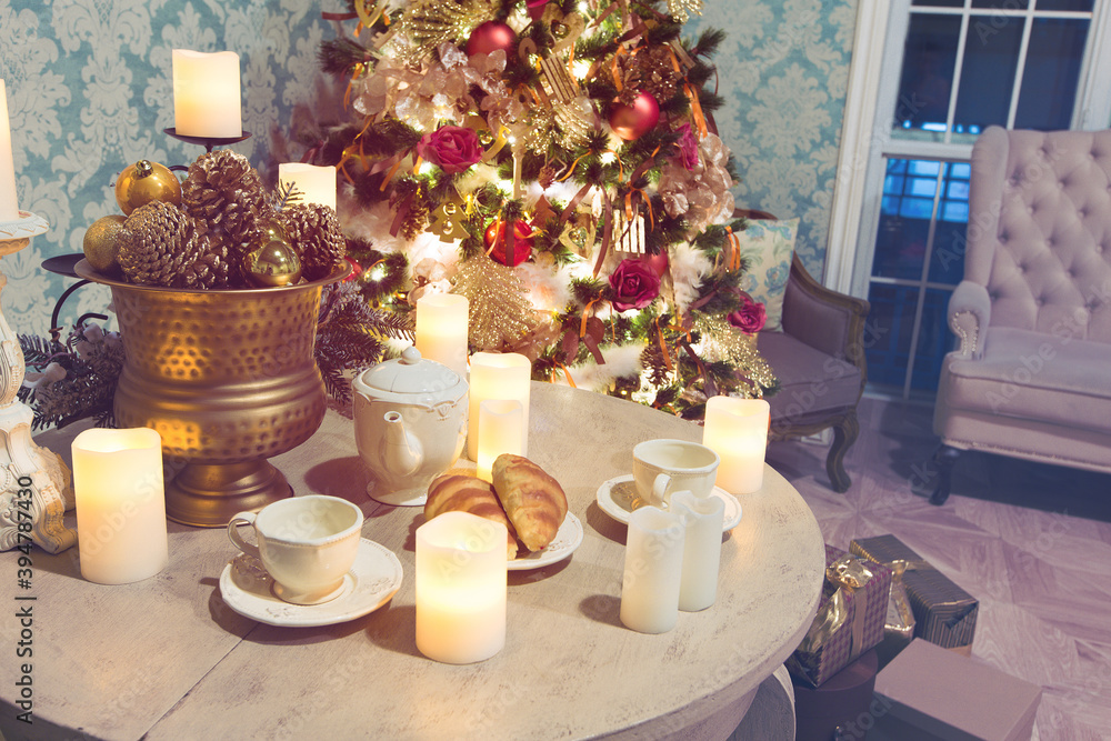 Luxury interior of living room with decorated Christmas tree and gifts on the wooden floor Luxury interior of living room with decorated Christmas tree and gifts on the wooden floor