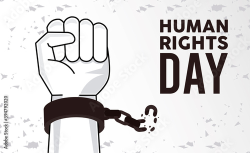 human rights day poster with hand breaking handcuffs