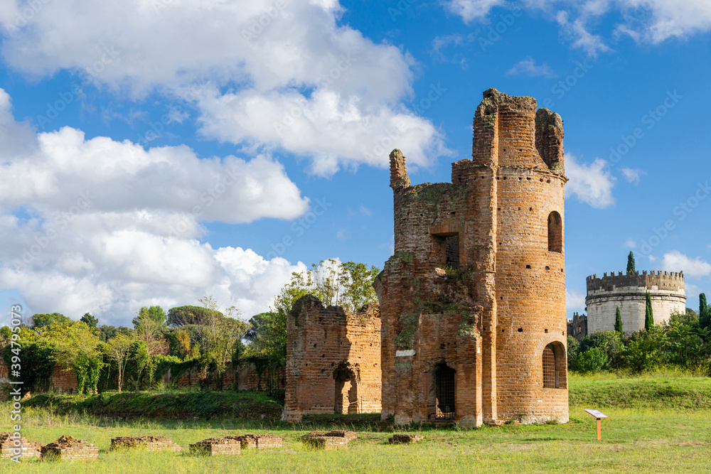 Beautiful landscape of Circle of  Massenzio, Rome, tower and Cecilia Metella tomb in Appian way, with nature blue sky and clouds. Italy.