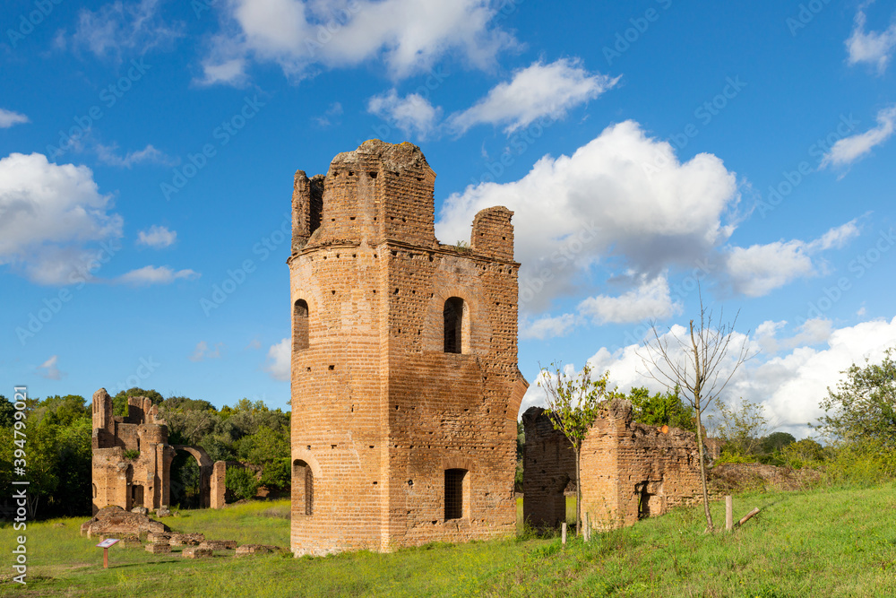 Beautiful particular and landacape of Tower, ruins of Circo di Massenzio, Via appia, with nature blue sky and clouds. Rome, Italy.
