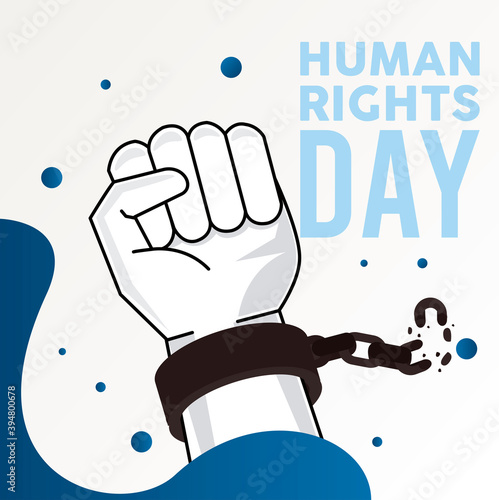 human rights day poster with hand breaking handcuffs