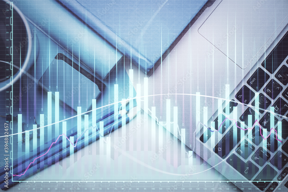 Double exposure of forex graph drawing over desktop background with computer. Concept of financial analysis. Top view. Double exposure of forex graph drawing over desktop background with computer. Concept of financial analysis. Top view.