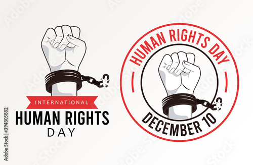 human rights day poster with hands breaking handcuffs