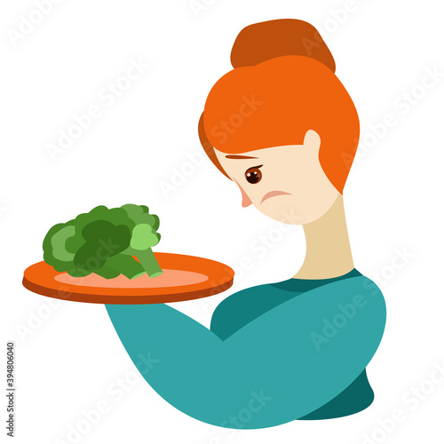 A woman looks sadly at a plate of broccoli