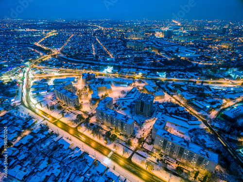 Evening aerial view to residential area in Kharkiv with snow