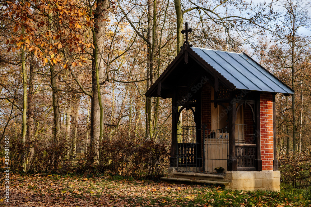 Chapel of Charlotte Chotkova in castle park in sunny autumn day, Altar in a carved wooden gazebo in the garden, Veltrusy chateau, Central Bohemia, Czech republic Chapel of Charlotte Chotkova in castle park in sunny autumn day, Altar in a carved wooden gazebo in the garden, Veltrusy chateau, Central Bohemia, Czech republic