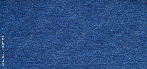 Close up of blue jeans texture background.