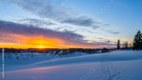 Sunset  in winter season with reflection on snow © vadimgouida
