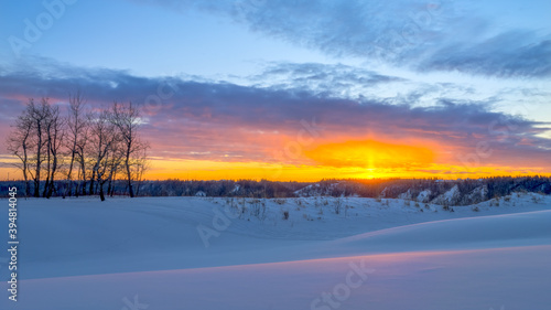 Sunset in winter season with reflection on snow