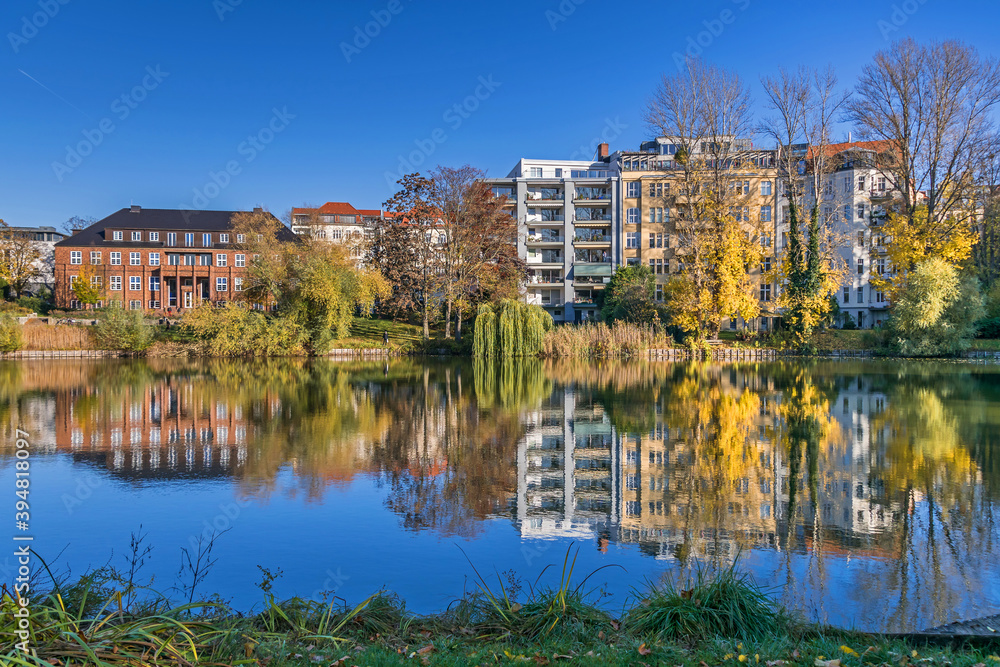 Park Lietzensee and buildings on the shore of Lake Lietzen in Berlin, Germany