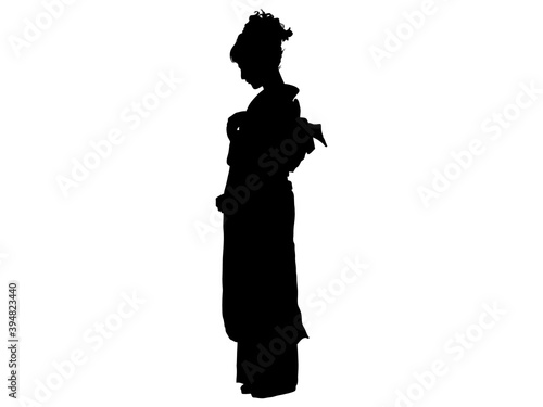 立っている和服女性の横顔シルエット