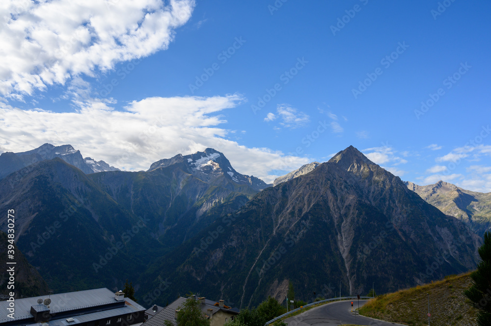 View on ski station Les deux Alpes and Alpine mountains peaks in summer, Isere, France