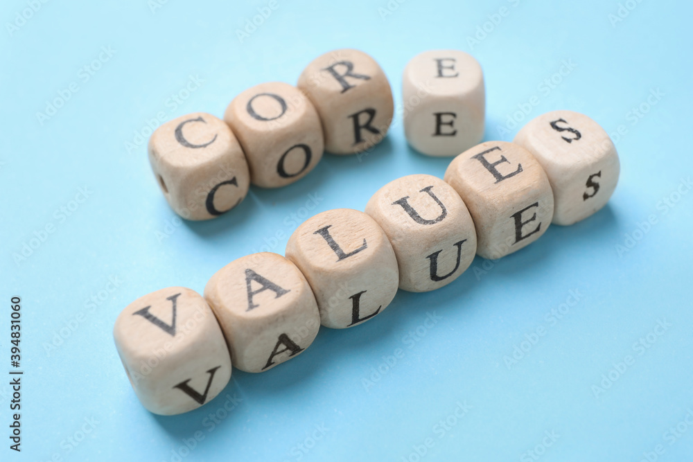 Beads with phrase CORE VALUES on light blue background Beads with phrase CORE VALUES on light blue background