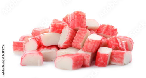 Many pieces of crab sticks on white background