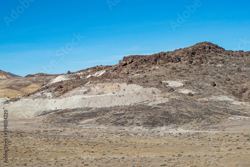 Tailings from a black fire opal mine in the Virgin Valley of Sheldon National Wildlife Refuge, Washoe County, Nevada.