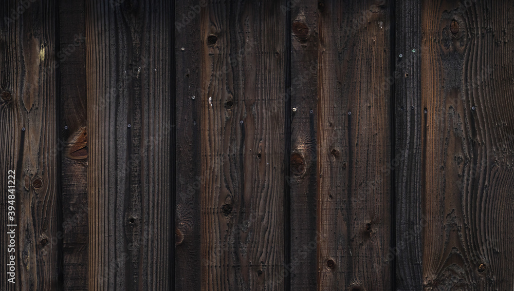Naklejka premium Dark wood background