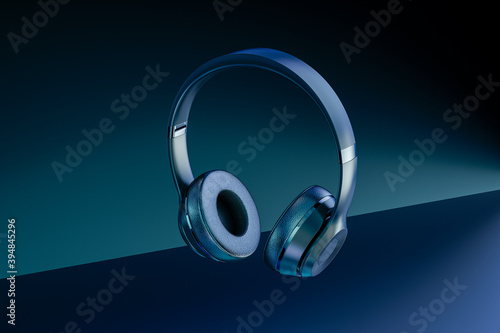 headphones on blue. Looking Down At Generic Music Headphones, Floating, Falling, Suspended, Isolated In A Blue and Black Studio Background. 3d rendering.