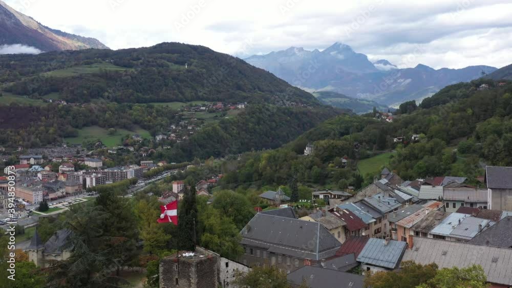 Aerial shot of the pretty old town (Conflans) overlooking Albertville, beautiful view of an old city surrounded by mountains, View of the Conflans, the medieval city located in upper savoy, France Aerial shot of the pretty old town (Conflans) overlooking Albertville, beautiful view of an old city surrounded by mountains, View of the Conflans, the medieval city located in upper savoy, France