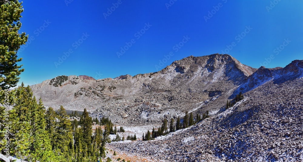 White Baldy peak views in Lone Peak Wilderness mountain landscape from Pfeifferhorn hiking trail, Wasatch Rocky mountain range, Utah, United States.