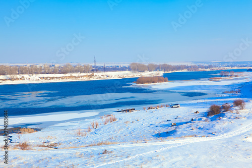 Awesome winter with frosty river . Winter tourism