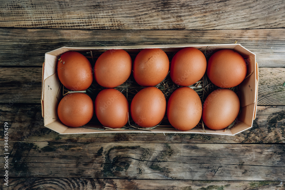 Fresh eggs on a rustic wooden background. Fresh eggs on a rustic wooden background.