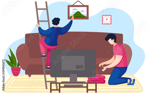 Cartoon young man going up the stairs hangs a picture on the wall in the living room back view. Character is doing household chores, the guy is folding clothes sitting on the floor near the TV