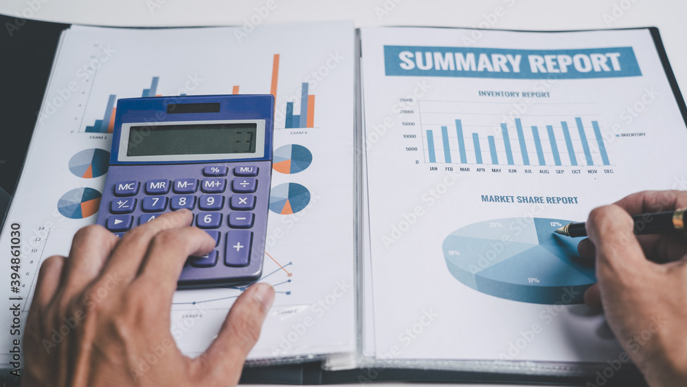 Businessman Asian people individual checking income tax form financial paper document at office. Businessman Asian people individual checking income tax form financial paper document at office.