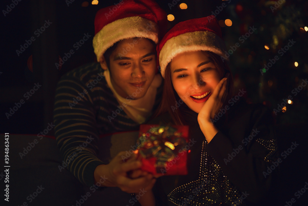 couple have ramantic moment together at christmas and new year celebration
