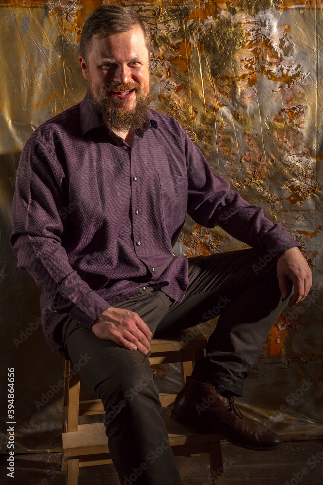 Obraz premium Mature bearded man dressed in shirt studio portrait