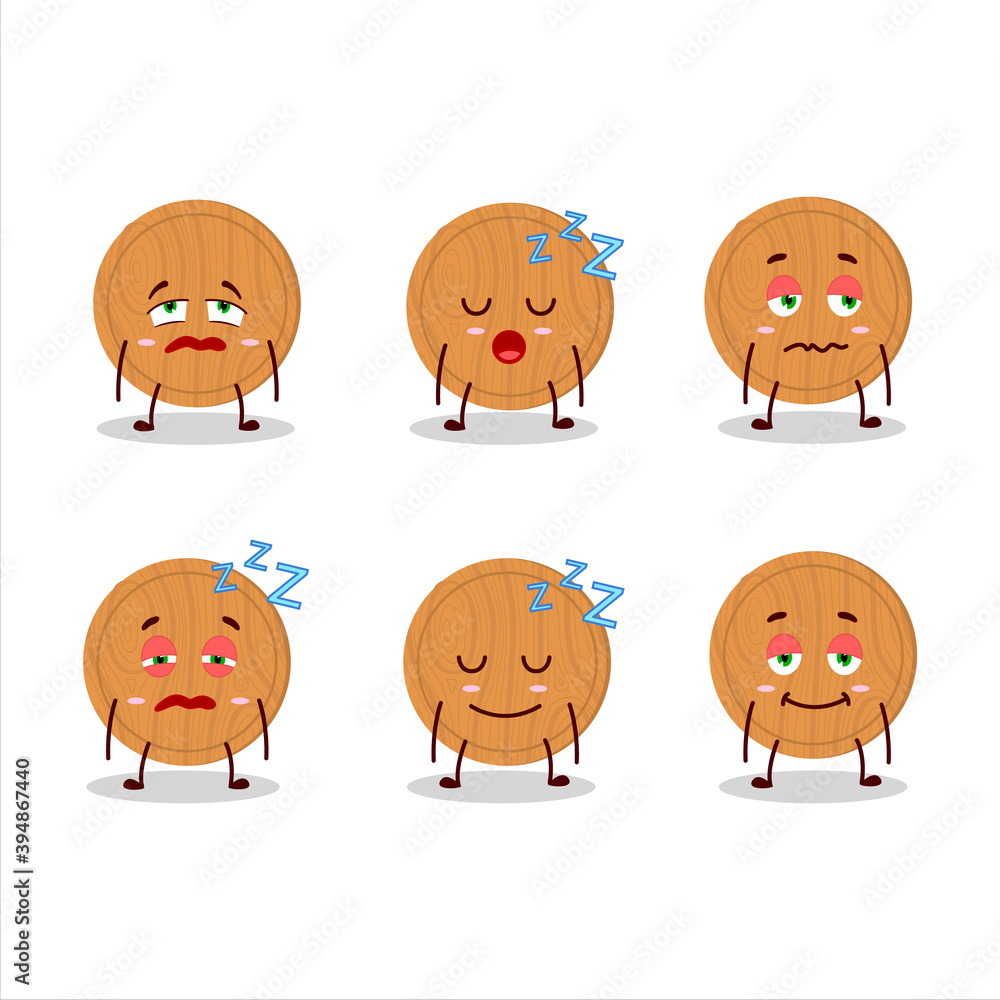 Cartoon character of circle wood cutting board with sleepy expression Cartoon character of circle wood cutting board with sleepy expression
