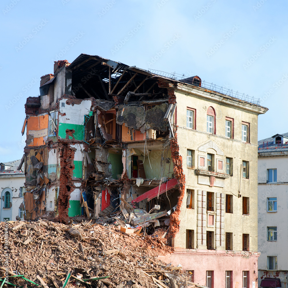 Pile of demolition rubble. Gray rubble at a building site. Pile of demolition rubble. Gray rubble at a building site.