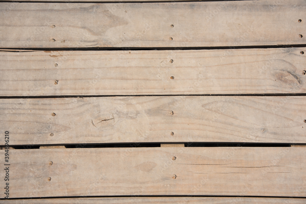 Obraz premium Surface of logs laid out to form the floor, copy space for text