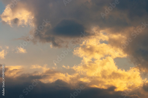 glowing clouds on evening sky. beautiful nature background