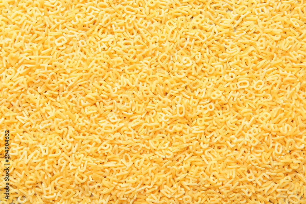 Tasty uncooked pasta as background Tasty uncooked pasta as background