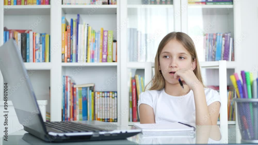 Bored Kid Studying for School, Tired Child at Study Office, Student Girl Doing Homework, Online Education in Pandemic Outbreak Bored Kid Studying for School, Tired Child at Study Office, Student Girl Doing Homework, Online Education in Pandemic Outbreak